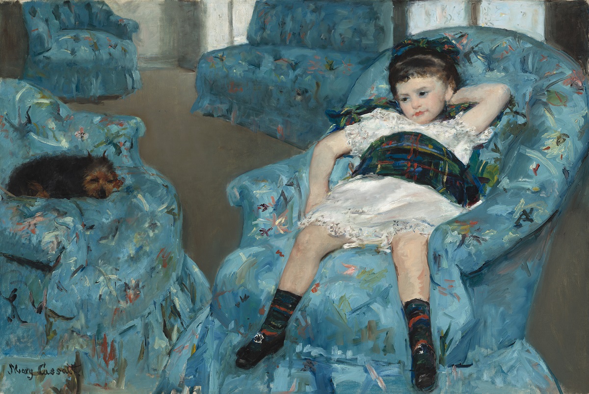Girl in blue chair with dog by Mary Cassatt